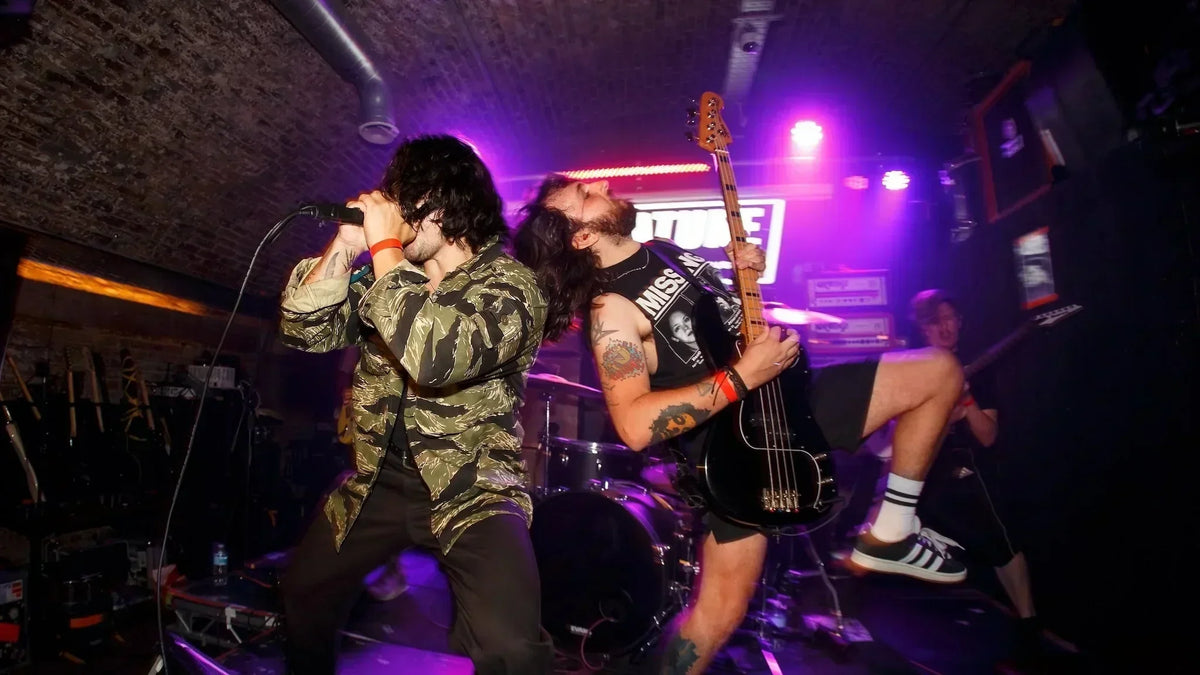Chaos Reigns UK hardcore band performing live with vocalist and bassist on stage