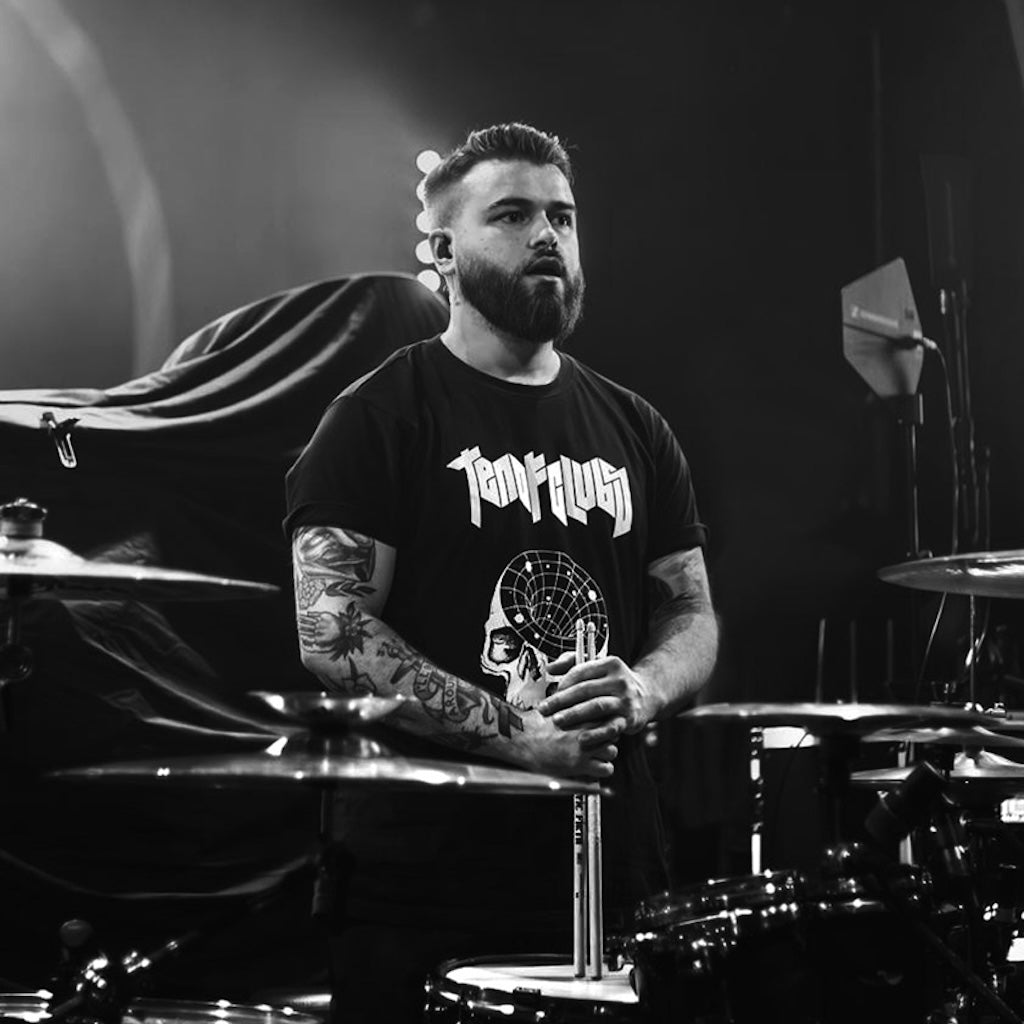 Defects drummer Harry Jennings in a TEN OF CLUBS Head Cave Tee