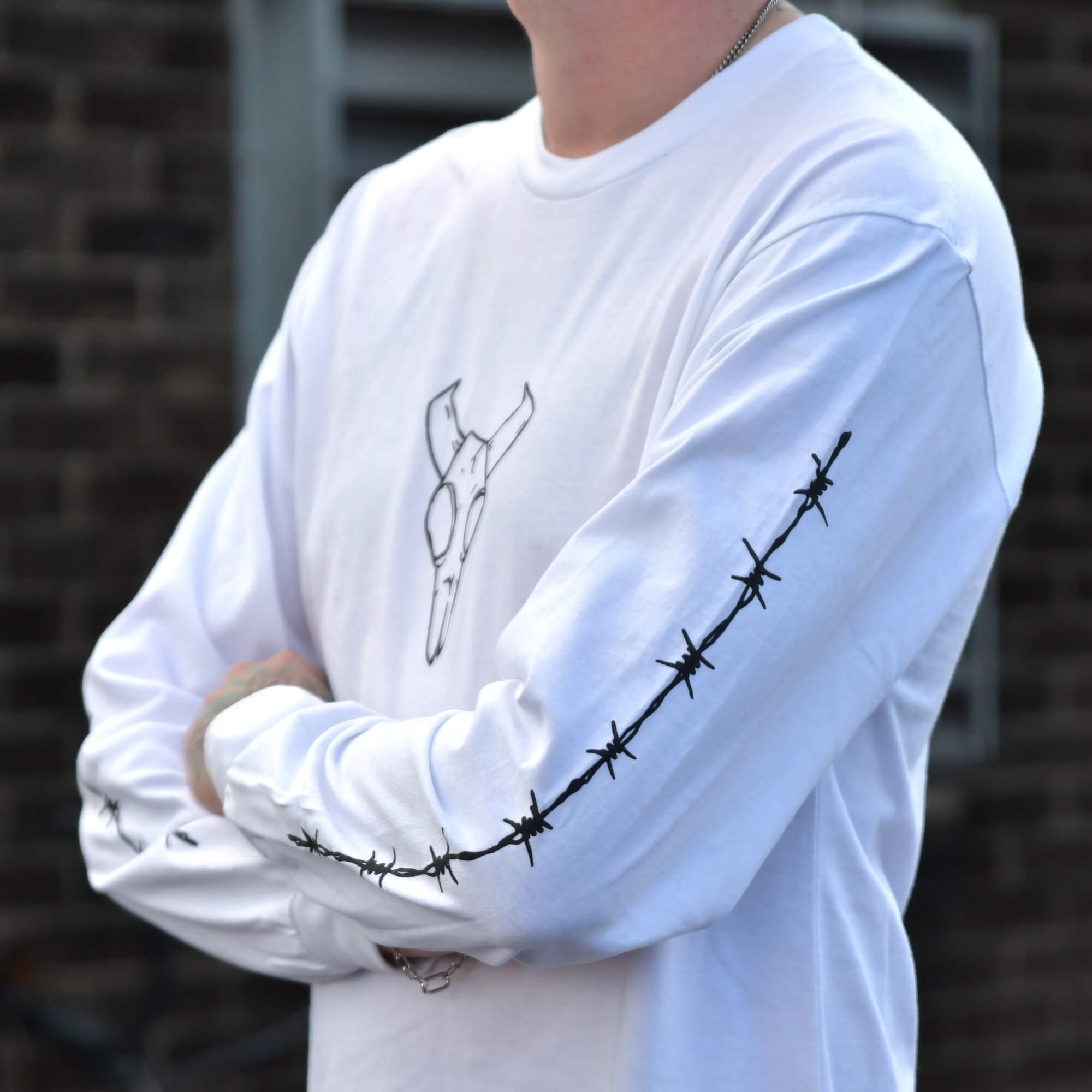 TEN OF CLUBS Bull Horns Long Sleeve Graphic Tee with barbed wire sleeve prints