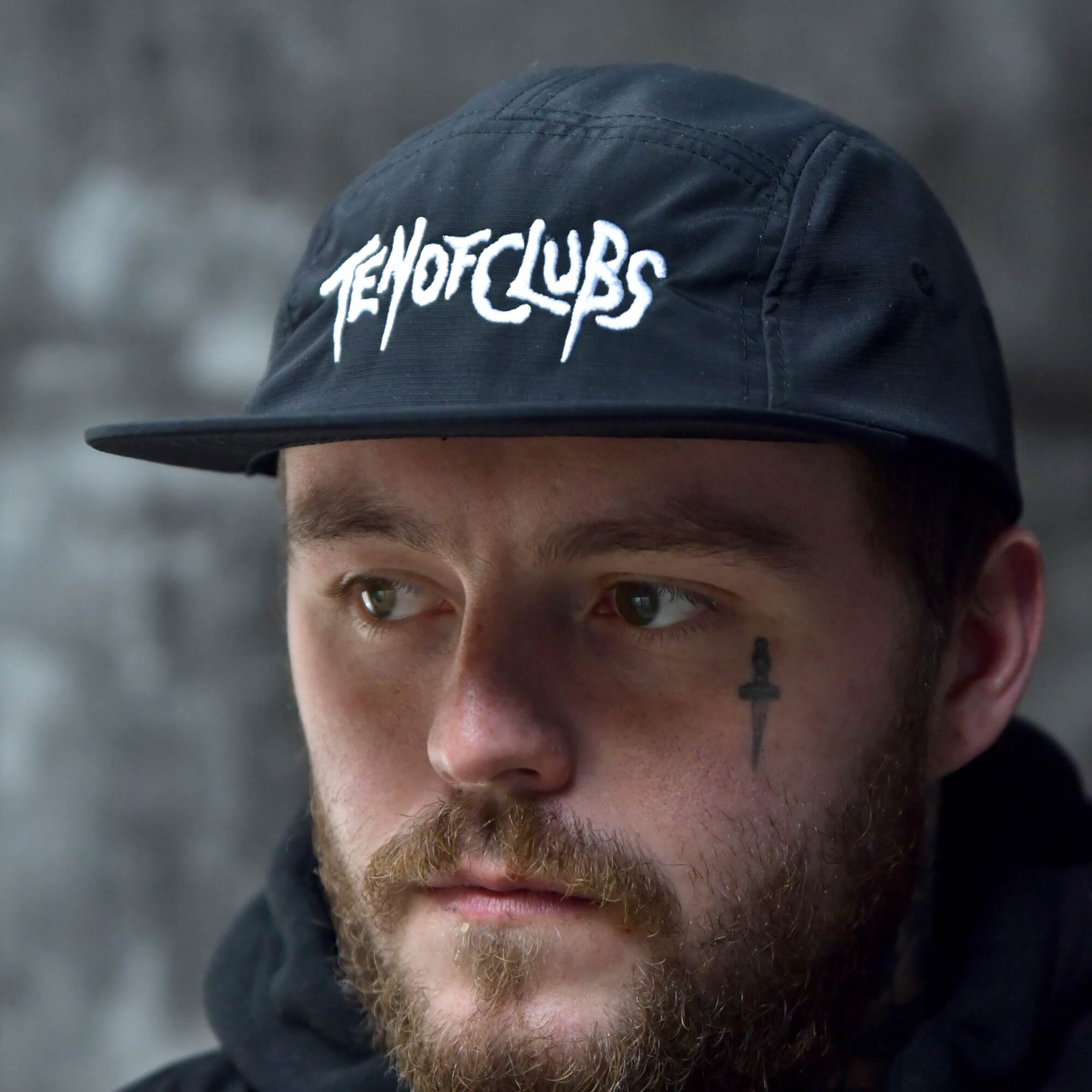 Model in TEN OF CLUBS 5-Panel Cap in black