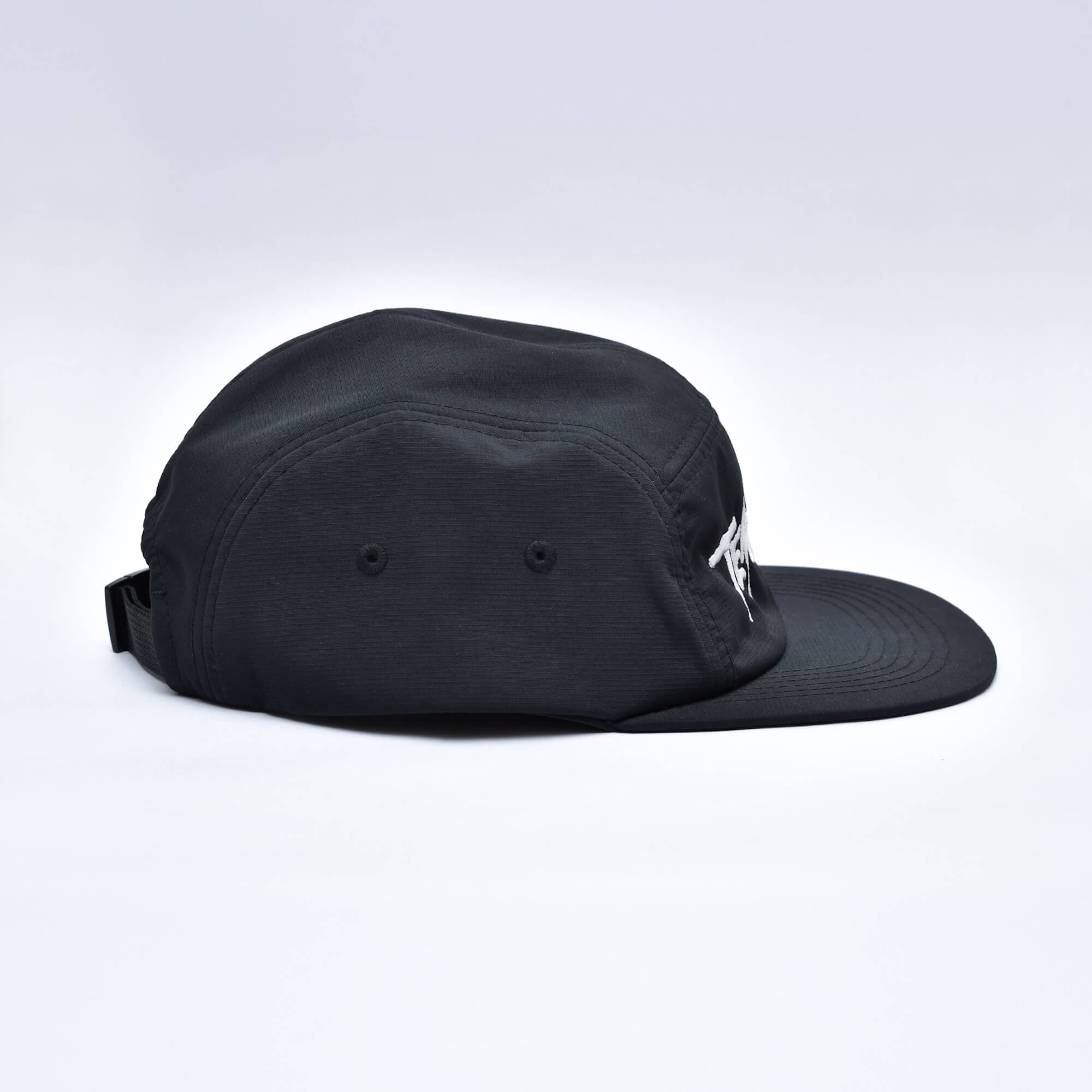 TOC 5-Panel Cap in black with TEN OF CLUBS embroidered logo in white, photographed from the right side against a clean white studio background.