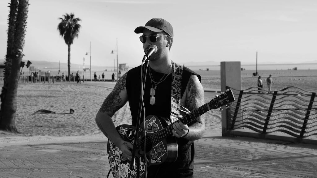 YvngError indie rock singer busking on the beach