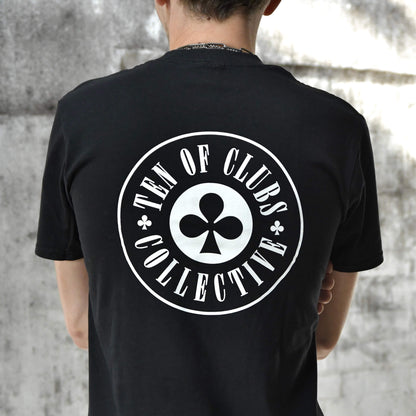 Model wearing Gunslinger Tee black graphic t-shirt with TEN OF CLUBS COLLECTIVE logo back print | alt streetwear by TEN OF CLUBS