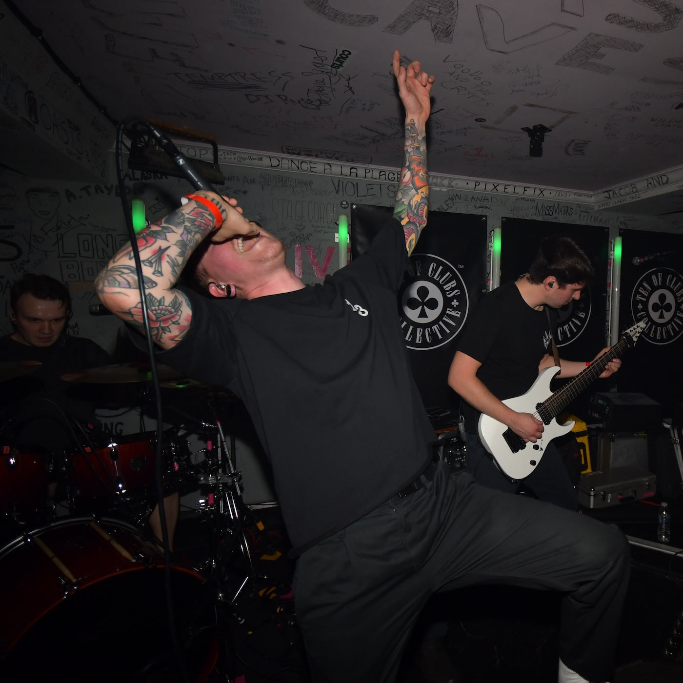 Severed Tongues metalcore band performing at TOCstock, the TEN OF CLUBS alternative shindig