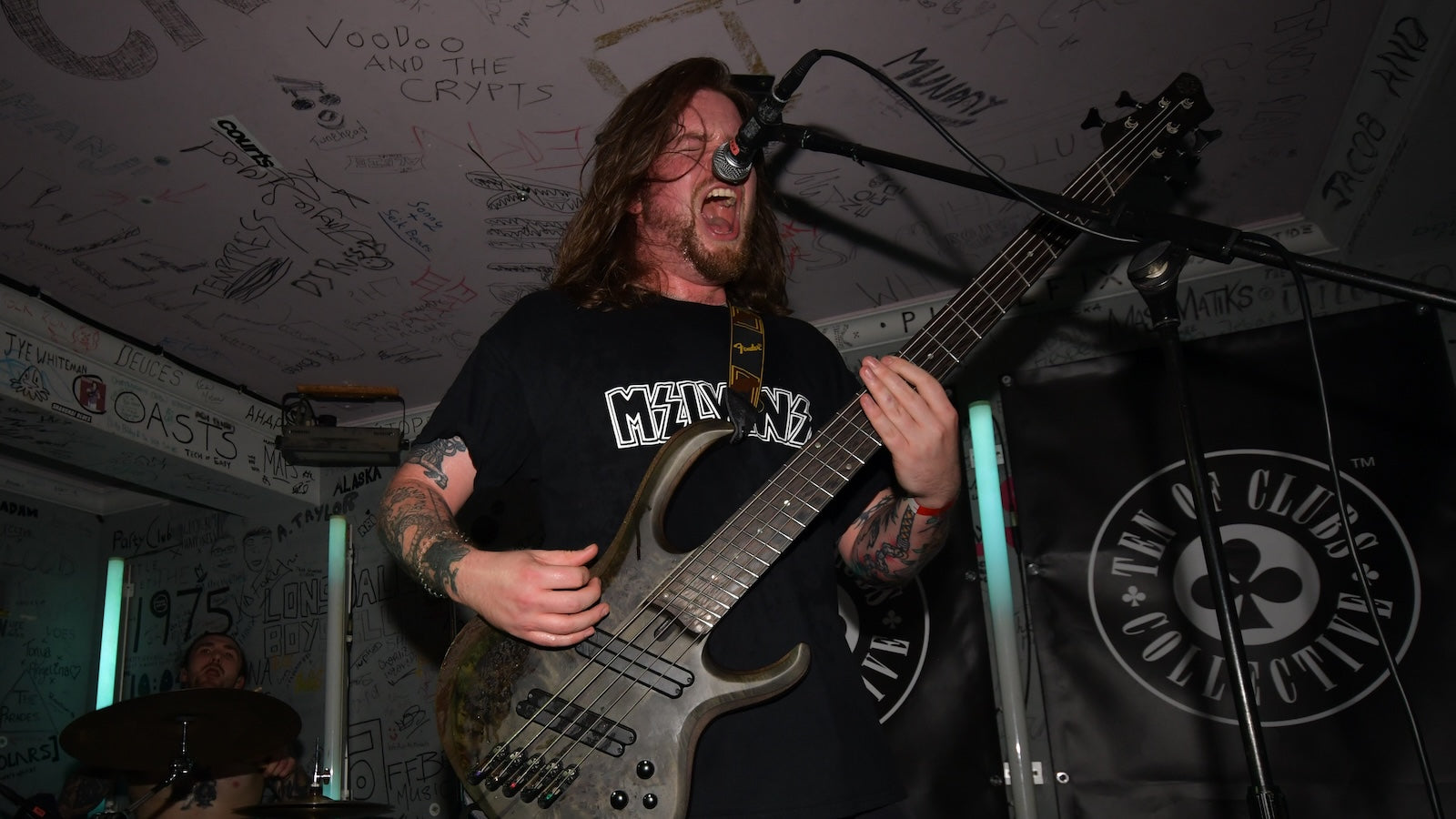 Sleemo bassist Jack Andrews performing at TOCstock, the TEN OF CLUBS alternative shindig