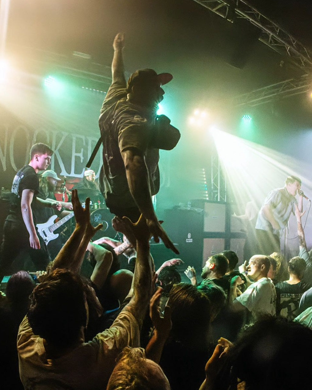 James from the Ragamuffin Music Podcast crowdsurfing at a gig